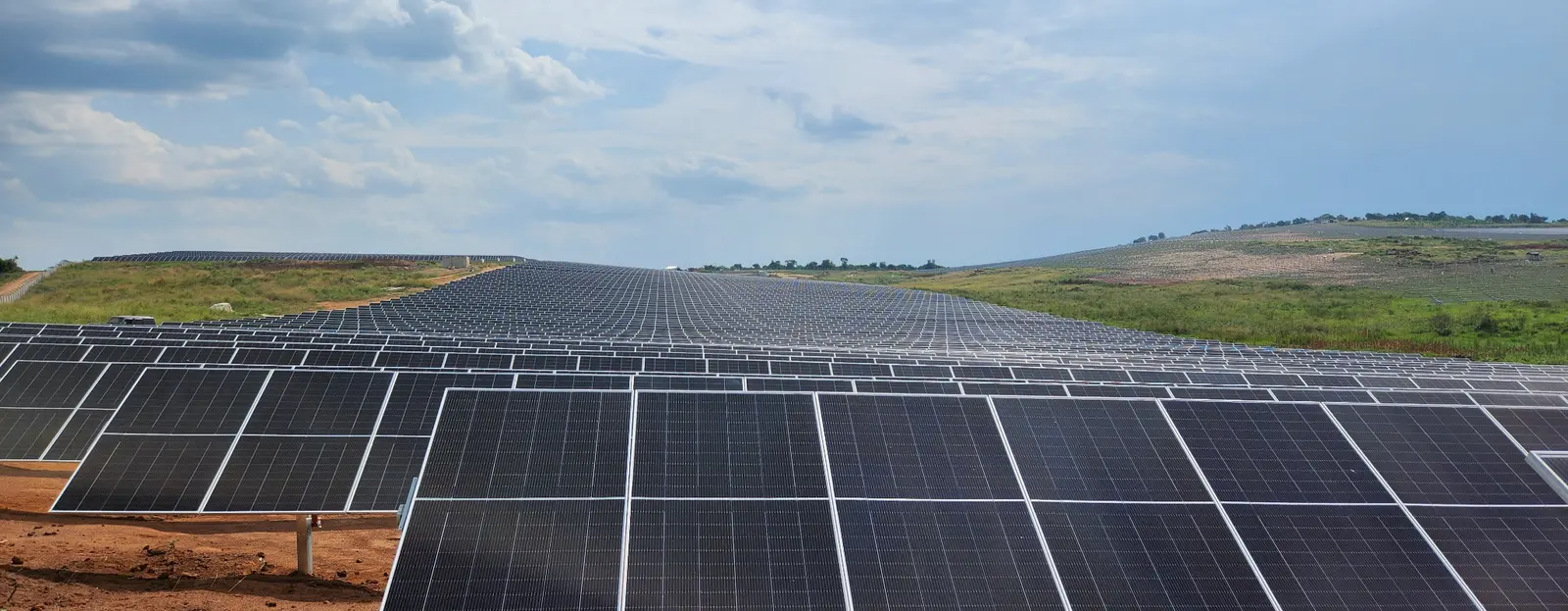 Rows of photovoltaic modules installed on a solar plant